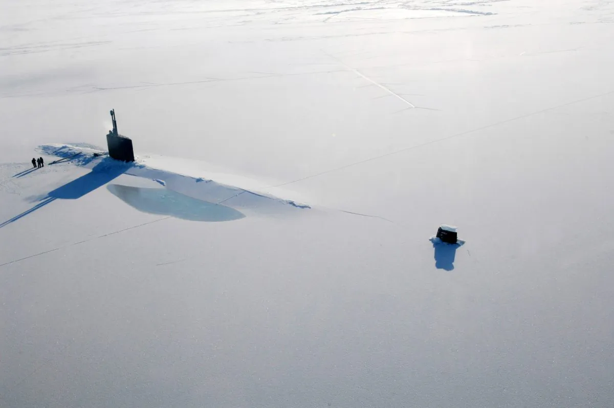 The Los Angeles-class submarine USS Annapolis rests on the Arctic Ocean after breaking through three feet of ice during Ice Exercise (ICEX) 2009 on March 21, 2009. The U.S. Navy teamed with the University of Washington Applied Physics Laboratory to train in the arctic environment. (Tiffini M. Jones/U.S. Navy via Getty Images)