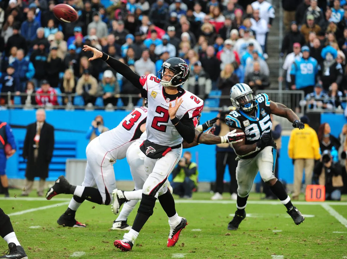 Matt Ryan of the Atlanta Falcons throws a pass against the Carolina Panthers at Bank Of America Stadium on Nov. 16, 2014 in Charlotte, North Carolina. The Falcons picked up a crucial win to take first place in the NFC South. (Scott Cunningham/Getty Images)