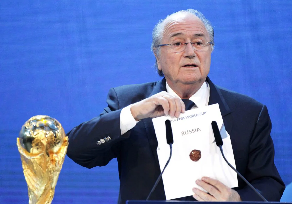 FIFA President Sepp Blatter announces Russia to host the 2018 World Cup during the announcement of the host country for the 2018 soccer World Cup in Zurich, Switzerland, on Dec. 2, 2010. FIFA has cleared Russia and Qatar of any wrongdoing in their winning bids for the next two World Cups. (AP Photo/Michael Probst)