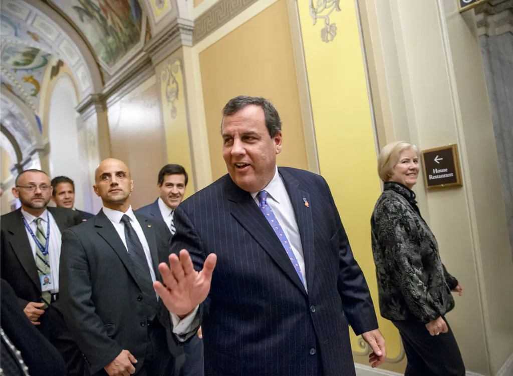 New Jersey Gov. Chris Christie leaves the Capitol in Washington on Nov. 17, 2014. Christie’s brash, say-it-like-it-is persona has made him a political celebrity. But as he relinquishes his position as chairman of the Republican Governors Association this week, Christie shifts from advocate for others to salesman for himself as a potential 2016 presidential candidate. (AP Photo/J. Scott Applewhite)