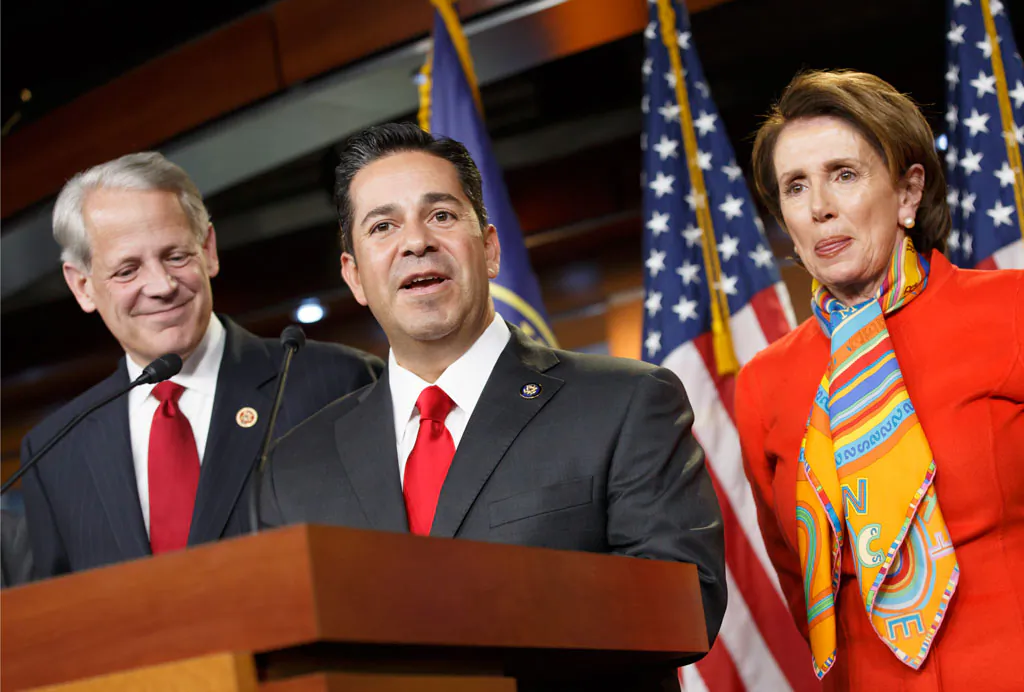 Rep. Ben Ray Lujan (D-N.M.) (C) flanked by Nancy Pelosi (D-Calif.) (R) and Rep. Steve Israel (D-N.Y.) (L), during a news conference at the Capitol in Washington on Nov. 17, 2014. (AP Photo)