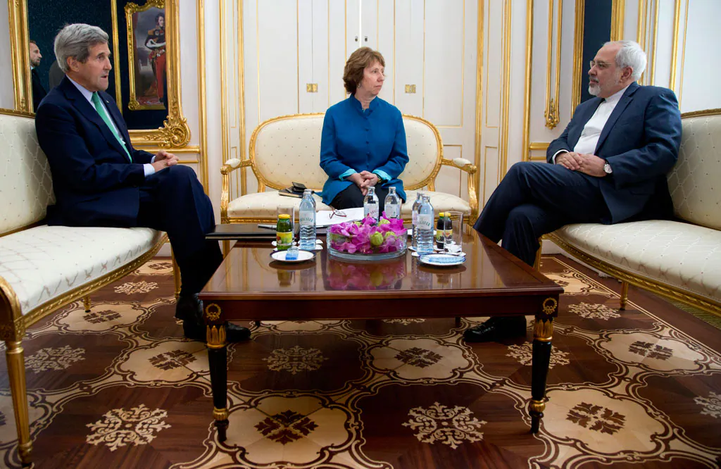 (L-R) U.S. Secretary of State John Kerry, European Union High Representative Catherine Ashton, and Iranian Foreign Minister Mohammad Javad Zarif participate in a trilateral meeting in Vienna, Austria, on Oct. 15, 2014. (AP Photo/Carolyn Kaster)