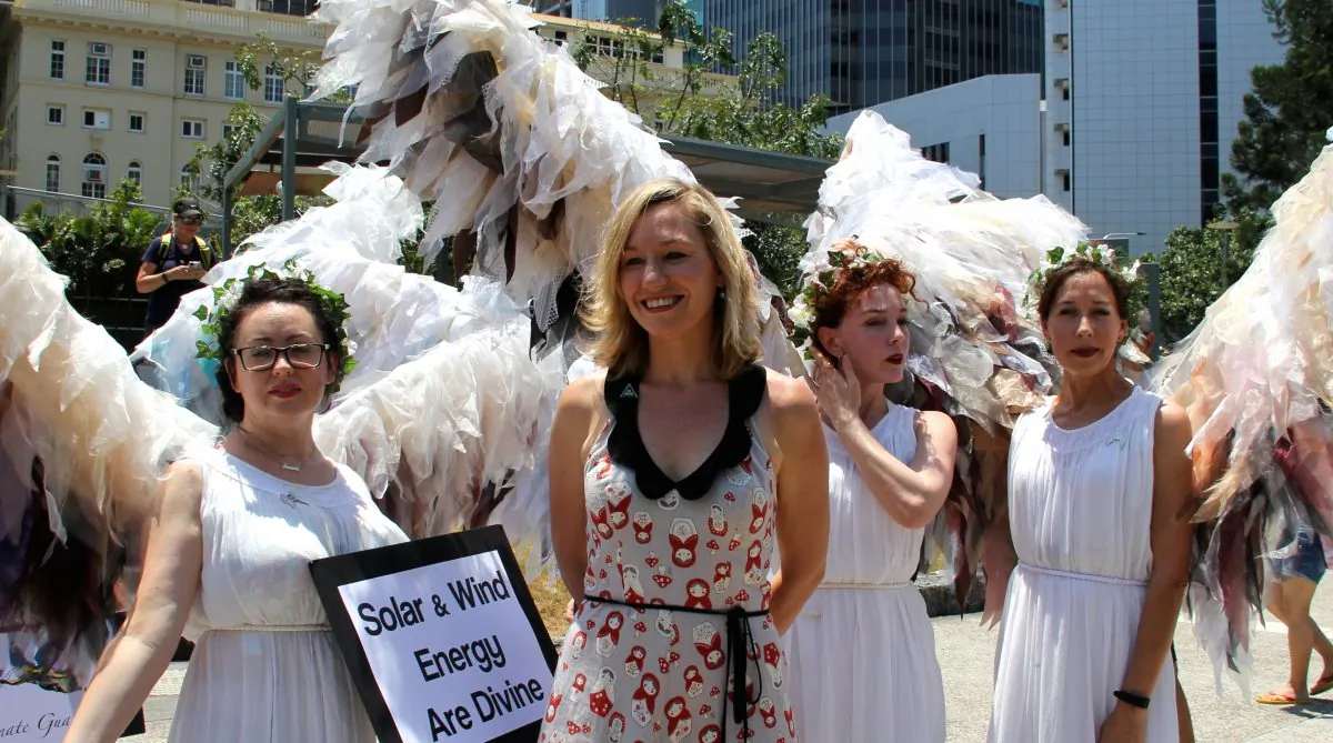 Queensland Greens Senator Larissa Waters surrounded by Climate Guardians at the independent People's Rally held during the G20 leaders meetings, Roma Street Forum, Brisbane Saturday November 15. (Shar Adams/Epoch Times)