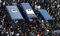 A Look at Victims, Assailants in Jerusalem Synagogue Attack