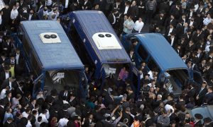 A Look at Victims, Assailants in Jerusalem Synagogue Attack