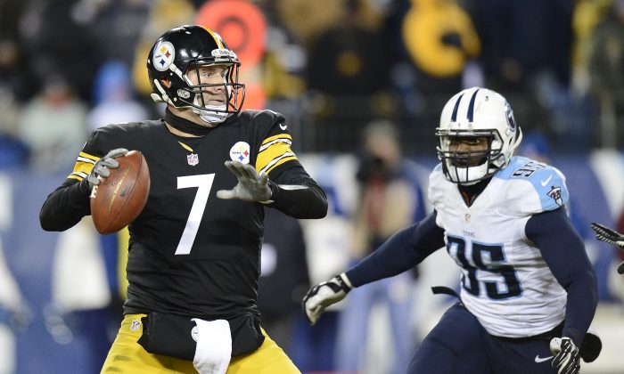 Pittsburgh Steelers quarterback Ben Roethlisberger (7) looks for a receiver as Tennessee Titans linebacker Kamerion Wimbley (95) rushes in the second half of an NFL football game Monday, Nov. 17, 2014, in Nashville, Tenn. (AP Photo/Mark Zaleski)