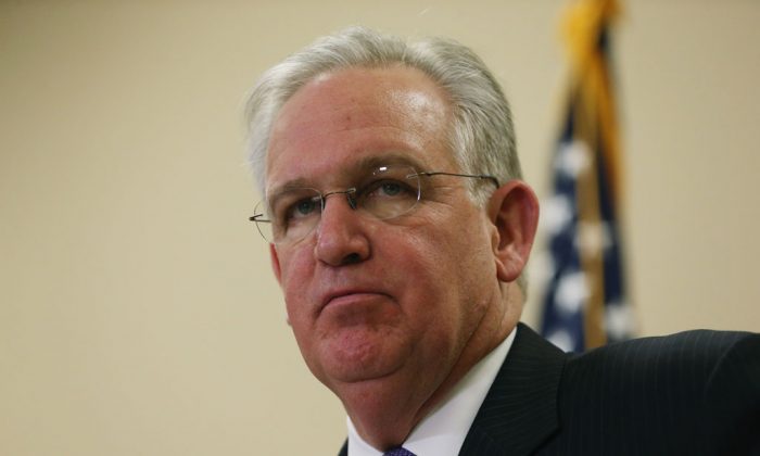 Missouri Governor Jay Nixon speaks to the media after announcing a 16-member Ferguson Commission on Nov. 18, 2014 in St. Louis, Missouri. The 16 member commission is being brought together to study issues that have arisen since the fatal police shooting of Michael Brown. (Joe Raedle/Getty Images)