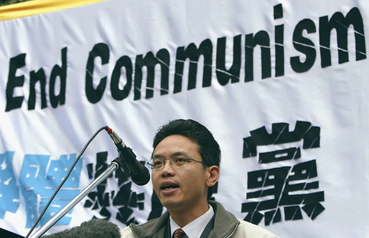 Chen Yonglin addresses the crowd during a rally on June 26, 2005 in Sydney, Australia. The rally was organised to demand that the defectors from China Chen Yonglin and Hao Fengjun be granted asylum by the Australian government. (Mark Kolbe/Getty Images) 