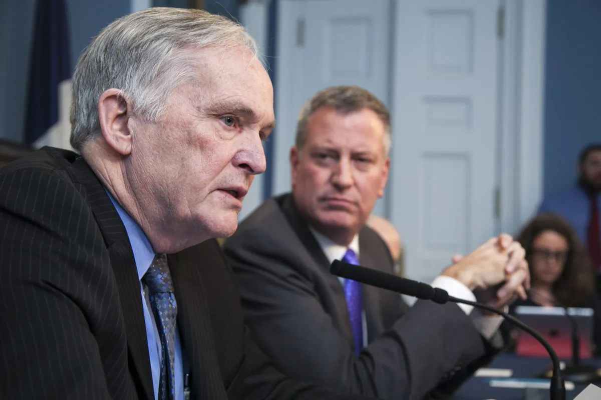 New York City Department of Correction commissioner Joseph Ponte (L) and Mayor Bill de Blasio at a media briefing on jail reforms at City Hall in New York on Nov. 20, 2014. (Samira Bouaou/Epoch Times)