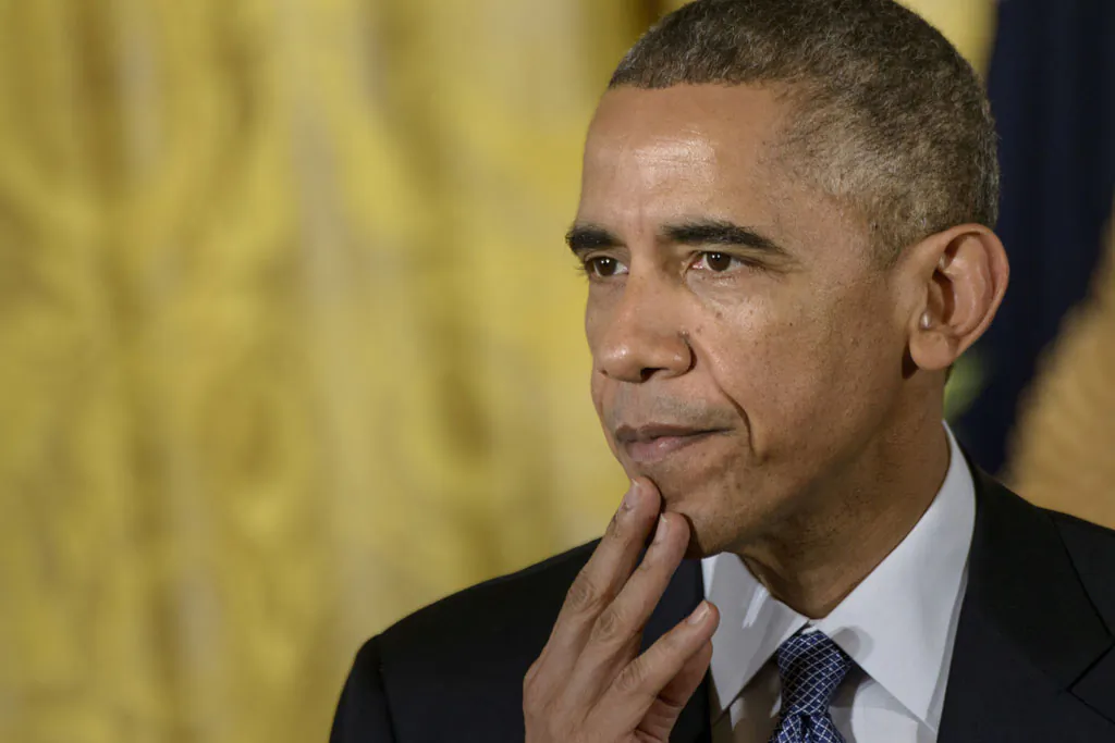 US President Barack Obama pauses while speaking at the ConnectED conference in the East Room of the White House Nov. 19, 2014, in Washington, DC. (Brendan Smialowski/AFP/Getty Images)