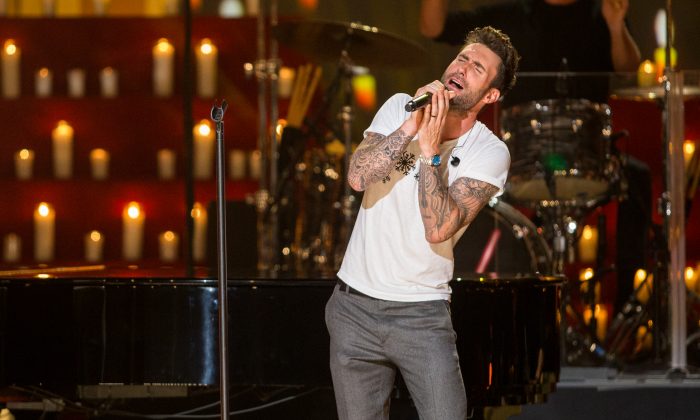 Adam Levine of Maroon 5  at The Shrine Auditorium in Los Angeles, Calif., on Nov. 18, 2014. Levine is the Academy's first pick to sing "Lost Stars" at the 87th Oscars.  (Photo by [Paul A.Hebert/Invision/AP)