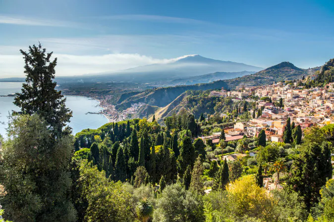 Taormina and the Etna via Shutterstock*