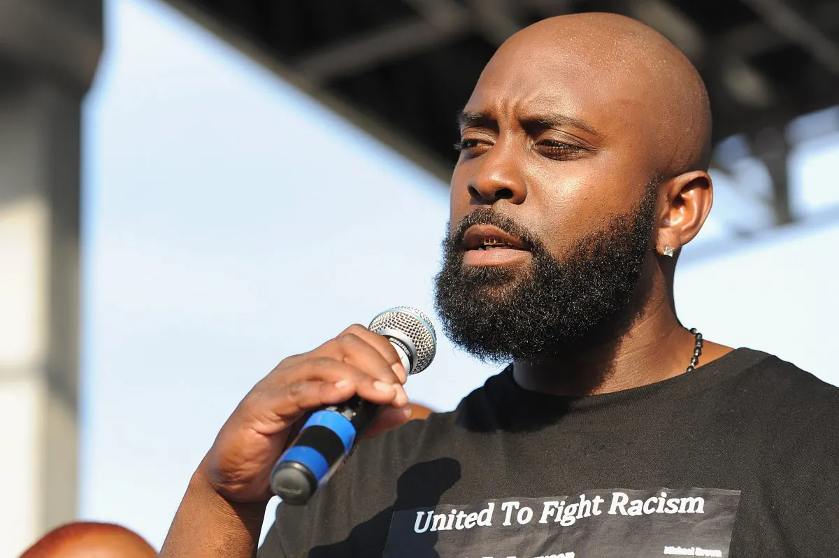 Michael Brown Sr., father of slain teenager Michael Brown Jr., speaks to the crowd during Peacefest, hosted by Better Family Life and the Trayvon Martin Foundation in St. Louis, Mo., on Aug. 24, 2014. (Michael B. Thomas/AFP/Getty Images)
