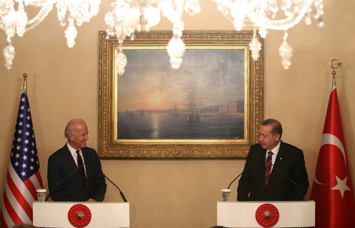 US Vice President Joe Biden (L) and Turkish President Recep Tayyip Erdogan speak to the media during a joint news conference in Istanbul, Turkey, Saturday, Nov. 22, 2014. Biden on Friday became the latest in a parade of US officials trying to push Turkey to step up its role in the international coalition's fight against Islamic State extremists. (AP Photo/Emrah Gurel)