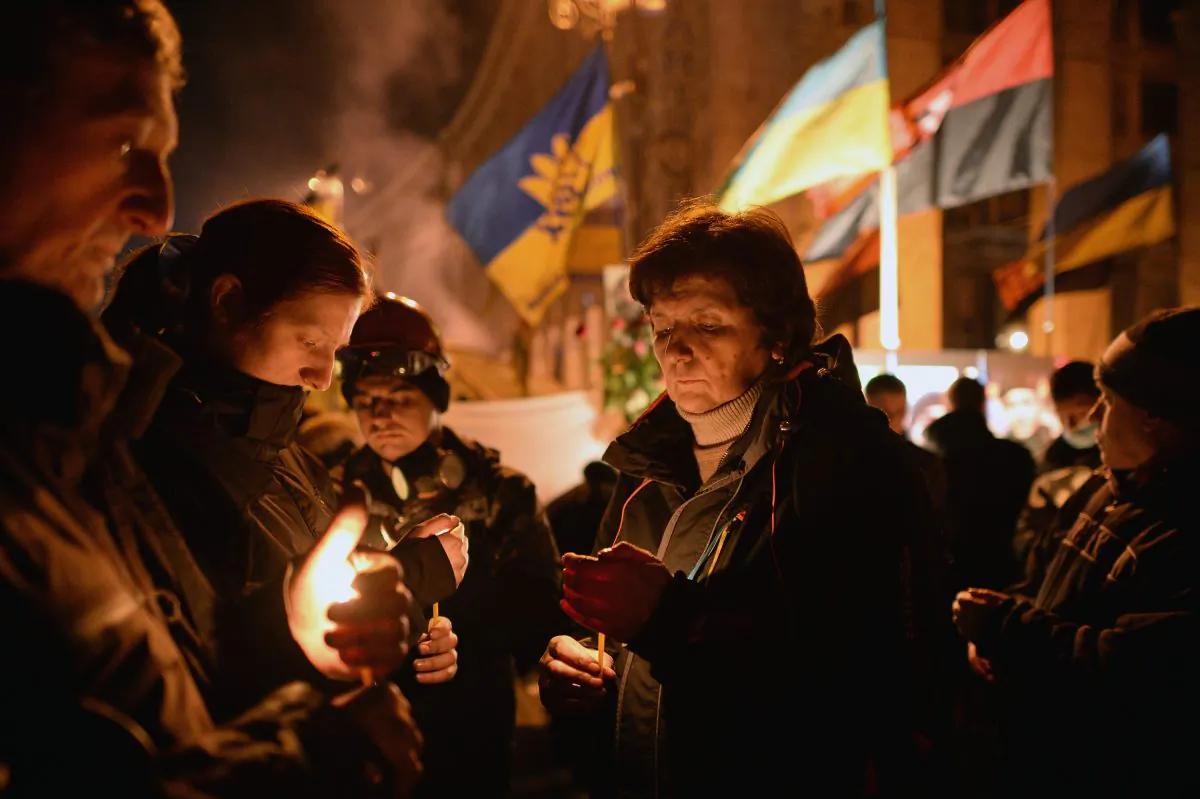 Prayers are held in Kiev, Ukraine, on Feb. 20, 2014, for victims who have died during anti-government protests. (Jeff J. Mitchell/Getty Images)