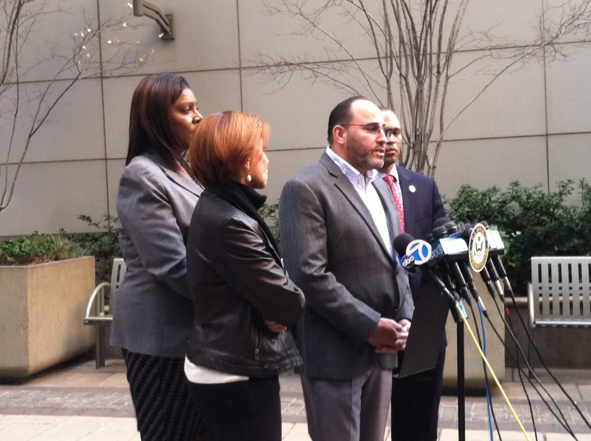 (L–R) Congress representative Nydia Valezquez, New York City public advocate Letitia James, president of Brooklyn's 75th precinct community council, John Rodriguez, and Congress representative Hakeem Jeffries, at a press conference in Brooklyn, N.Y., on Sunday, Nov. 23, 2014. Following the death of Akai Gurley after a police officer accidentally shot him inside a Brooklyn public housing project, officials called for changes to police department protocol. (Annie Wu/Epoch Times)