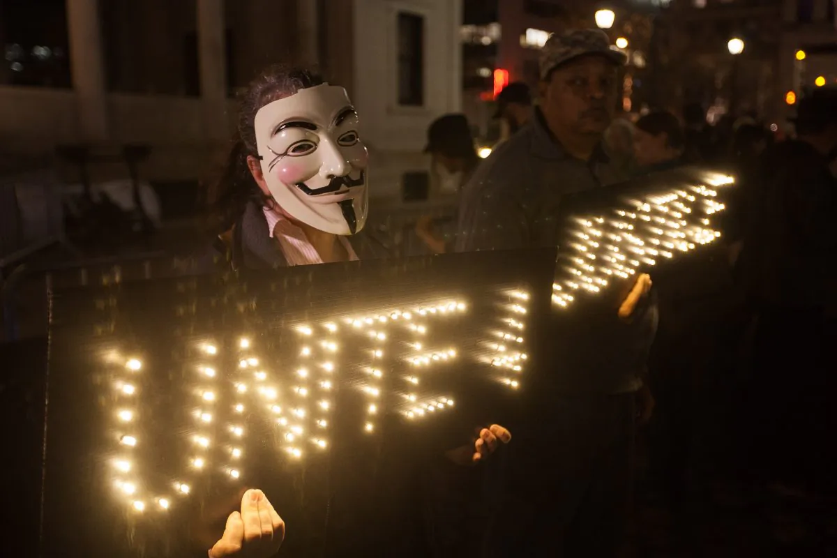 A protest against racial profiling by police on Union Square, Manhattan, NY, on Nov. 24, 2014. Dozens of protests were scheduled around the nation to coincide with Nov. 24 St. Louis Grand Jury announcement of its decision on whether to indict Darren Wilson, a police officer in Ferguson, MO, who shot dead local man Michael Brown, 18, on Aug 9. (Petr Svab/Epoch Times)
