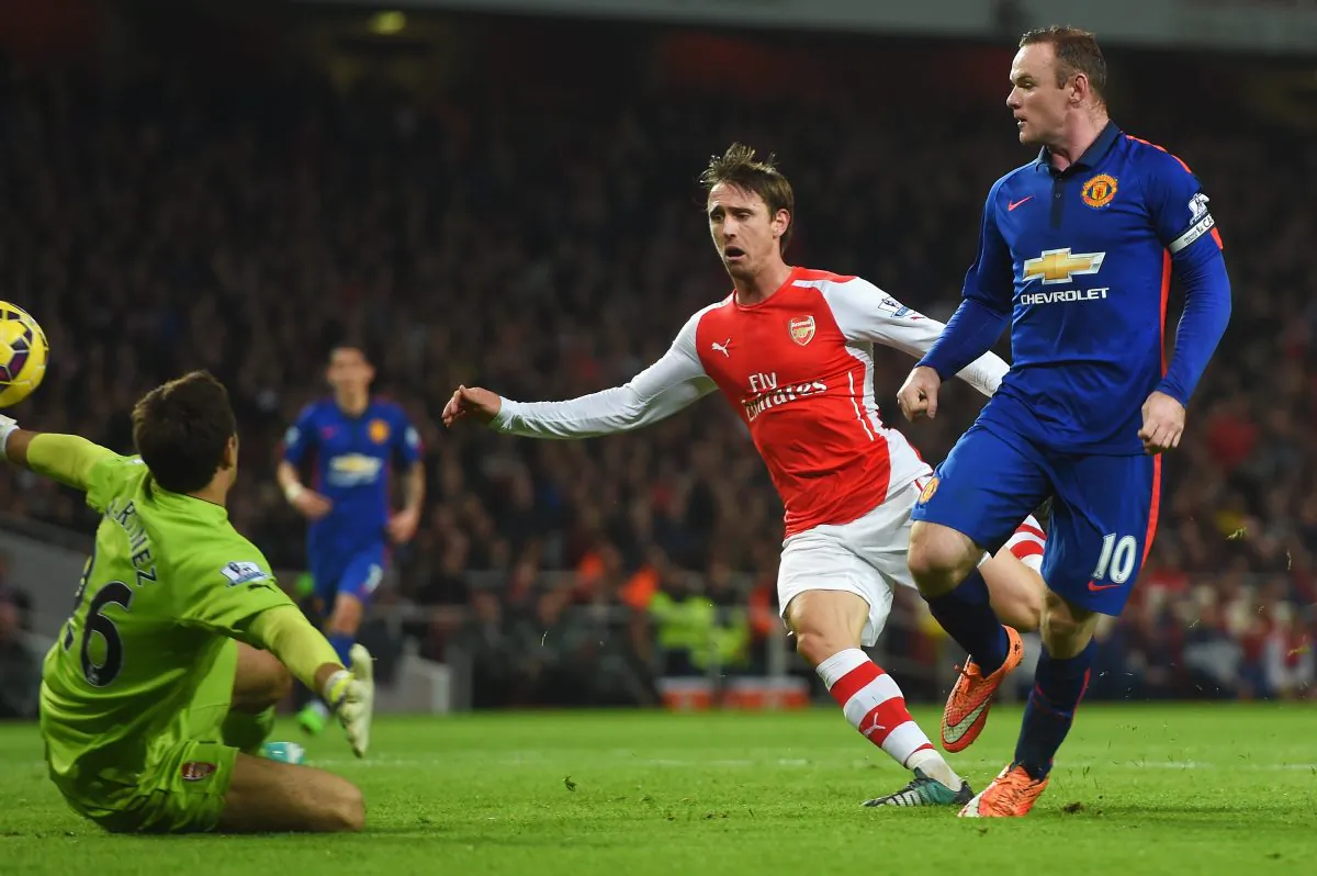 Wayne Rooney scores Manchester United's second goal against Arsenal at Emirates Stadium on Nov. 22, 2014 in London, England. (Michael Regan/Getty Images)