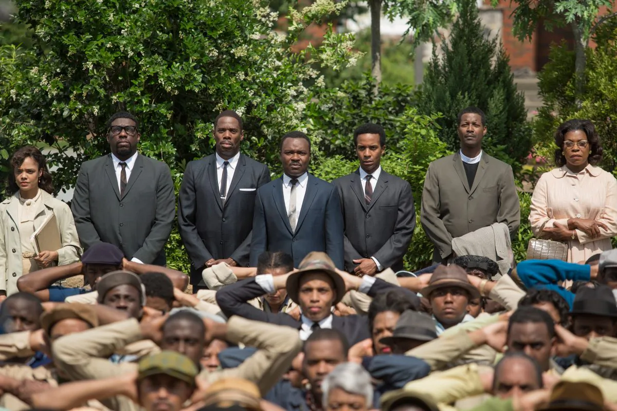 This image released by Paramount Pictures shows, standing from left, Tessa Thompson, Omar Dorsey, Colman Domingo, David Oyelowo as Martin Luther King, Jr., André Holland, Corey Reynolds and Lorraine Toussaint in a scene from "Selma." The film was nominated for five Spirit Awards on Tuesday, Nov. 25, 2014. Winners will be revealed at the annual awards ceremony on Feb. 21. 2015. The ceremony will air live from Santa Monica, Calif. on IFC. (AP Photo/Paramount Pictures, Atsushi Nishijima)