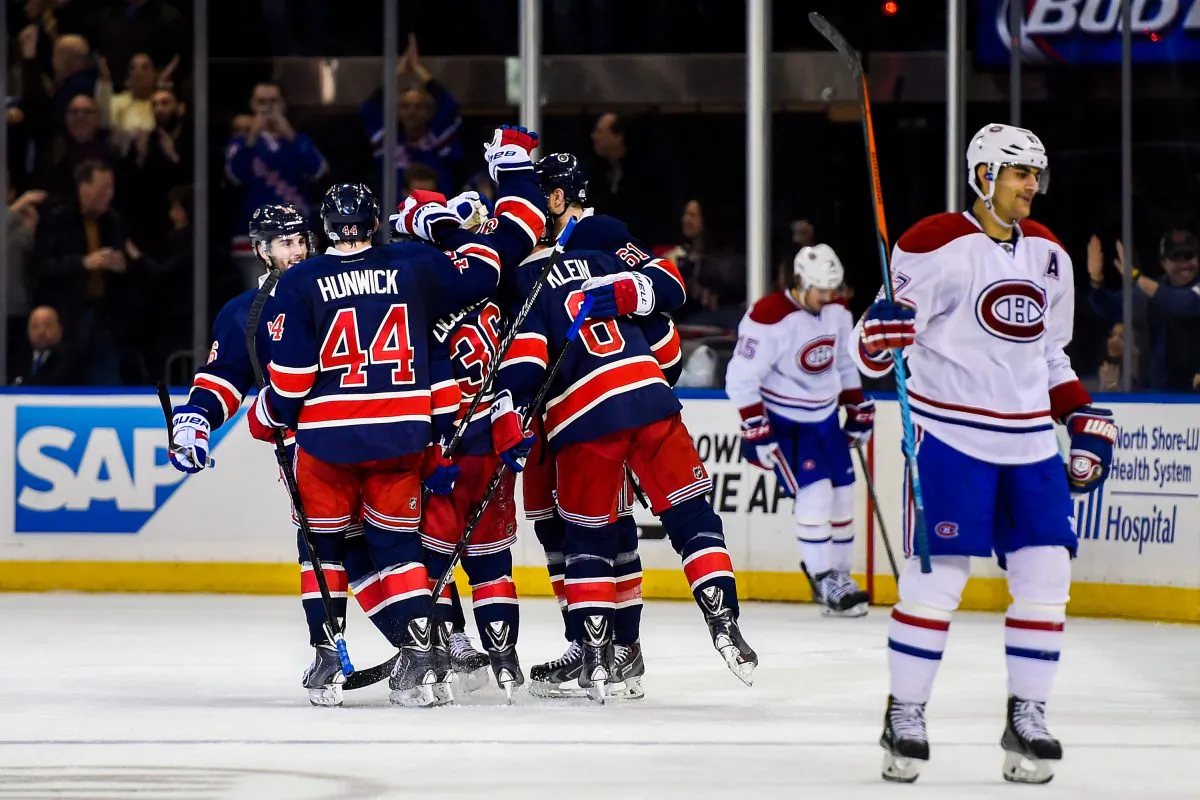 The New York Rangers celebrate a goal against the Montreal Canadiens at Madison Square Garden on Nov. 23, 2014 in New York City. Surprisingly, the regulation time loss by high-flying Montreal was its sixth by at least three goals this season. (Alex Goodlett/Getty Images)