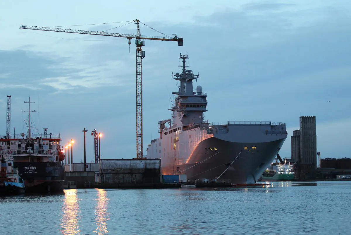 The Vladivostok Mistral-class helicopter carrier docking at Saint-Nazaire harbor, western France, on Nov.14, 2014. (AP Photo/Laetitia Notarianni)
