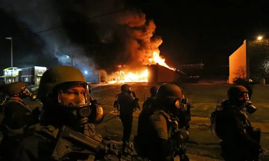 Protester Shoved to the Ground and Beaten by Police in Shaw, Missouri (Video)