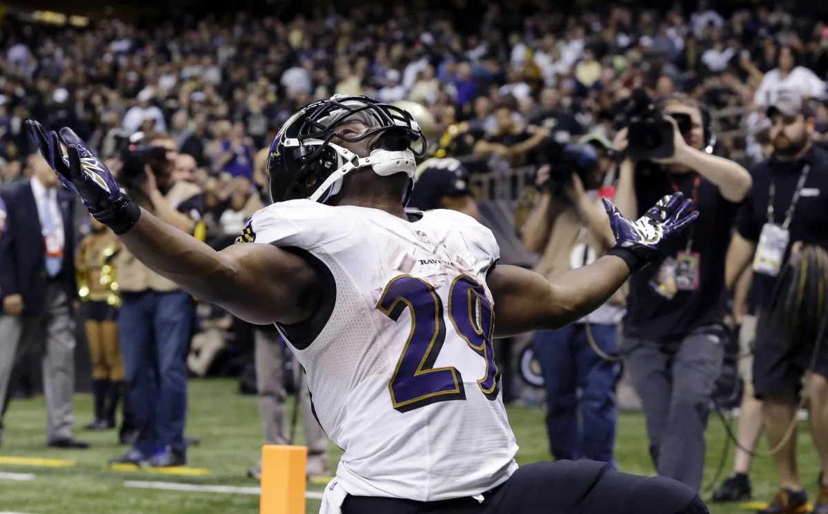 Baltimore Ravens running back Justin Forsett celebrates his touchdown carry in the second half of an NFL football game against the New Orleans Saints in New Orleans, Monday, Nov. 24, 2014. The Ravens won 34-27. (AP Photo/Jonathan Bachman)