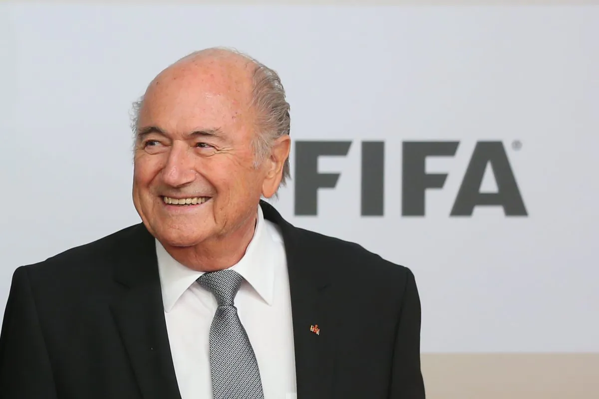 FIFA President Joseph S. Blatter arrives for the movie premiere 'Die Mannschaft' at Sony Center Berlin on Nov. 10, 2014, in Berlin, Germany. (Alexander Hassenstein/Bongarts/Getty Images)