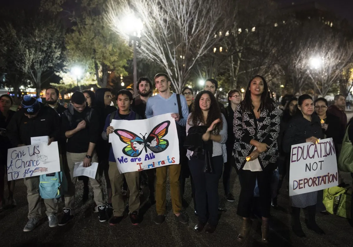 Demonstrators at a vigil to support children fleeing violence in Central America, near the White House in Washington on Nov. 24. (SAUL LOEB/AFP/Getty Images)