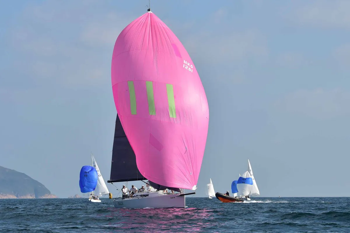 ‘Mojito’ winner of Races-4 & -5 on Day-2 of the UK Sailmakers Winter Saturday Series heading for the Leeward Mark in Port Shelter during Race-3 on Saturday Nov 22, 2014. (Bill Cox/Epoch Times)