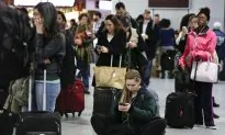 Sloppy Weather Slows Thanksgiving Travelers