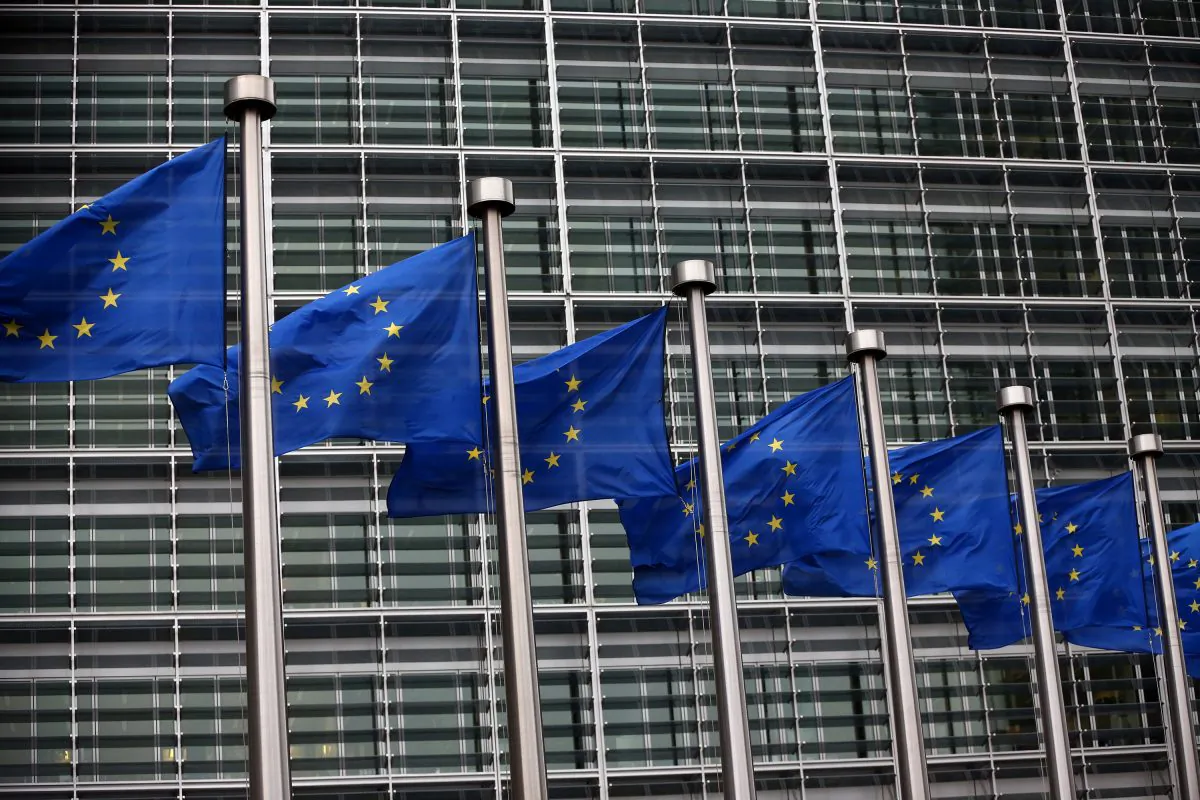 European Union flags are pictured outside the European Commission building on Oct. 24, 2014 in Brussels, Belgium. (Carl Court/Getty Images)
