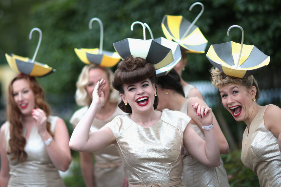 ASCOT, ENGLAND - JUNE 17:  The Tootsie Rollers laugh as they break up from a group photo on day 2 of Royal Ascot at Ascot Racecourse on June 17, 2015 in Ascot, England.  (Photo by Chris Jackson/Getty Images)