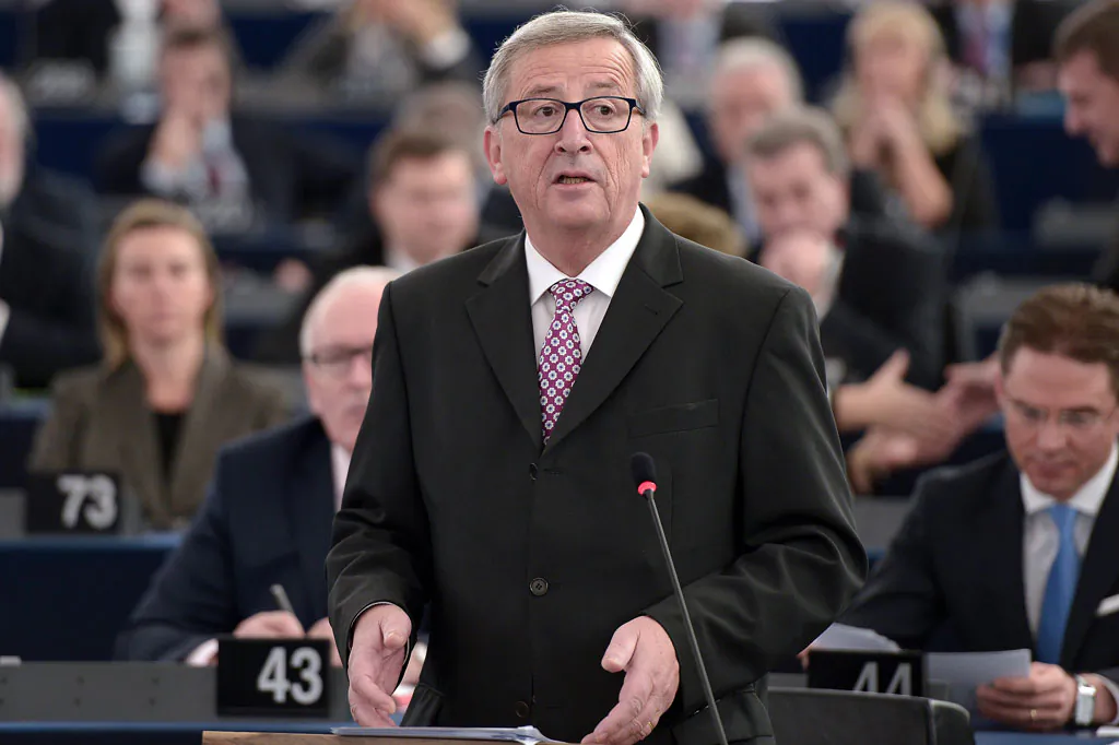 EU Commission chief Jean-Claude Juncker speaks to unveil a 315 billion-euro investment plan to kickstart the economy, on Nov. 26, 2014, at the European Parliament in Strasbourg, eastern France. (Frederick Florin/AFP/Getty Images)