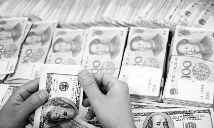 US$19.6 million cash and 27 Kg gold were seized from the home of a minor official who managed a state water company. The official is under investigation for corruption, China's state-run Xinhua News Agency reported. (ChinaFotoPress/Getty Images)