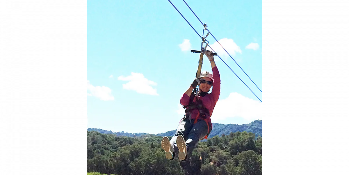 Writer Beverly Mann ziplining on Santa Margarita Ranch overlooking the vineyards of Paso Robles Wine Country. (Courtesy of Margarita Adventures)