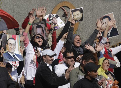Supporters of former Egyptian President Hosni Mubarak greet him as his helicopter ambulance landed at Maadi Military Hospital, following his verdict in Cairo, Egypt, Saturday, Nov. 29, 2014. An Egyptian court on Saturday dismissed criminal charges against former president Hosni Mubarak in connection with the killing of protesters in the 2011 uprising that ended his nearly three-decade reign. (AP Photo/Amr Nabil)
