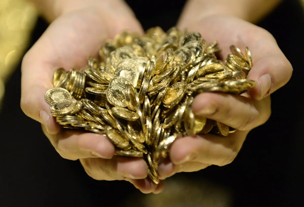 Gold coins during an exhibition in Lenzburg, Switzerland, on Nov. 16, 2014. China is getting as much gold as it can get its hands on as well. (AP Photo/Keystone, Steffen Schmidt) 