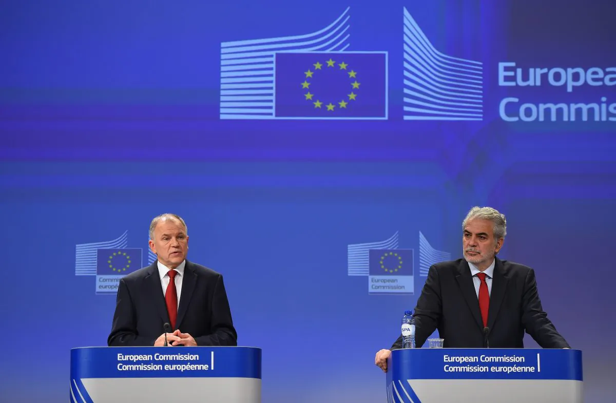 European Commissioner for Humanitarian Aid and Crisis Management and EU Ebola coordinator Christos Stylianides (R) and Commissioner for Health and Food Safety Vytenis Andriukaitis at the European Commission headquarters in Brussels, Belgium on Nov. 18, 2014 after visiting Ebola-affected area in Africa. (Emmanuel Dunand/AFP/Getty Images)
