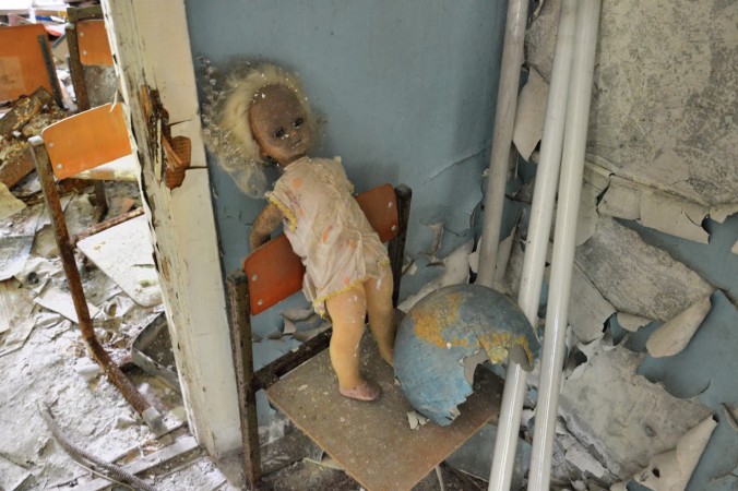 A doll in one of the classrooms in a school in Pripyat (Tomasz Lisowski, www.adventurous-travels.com)