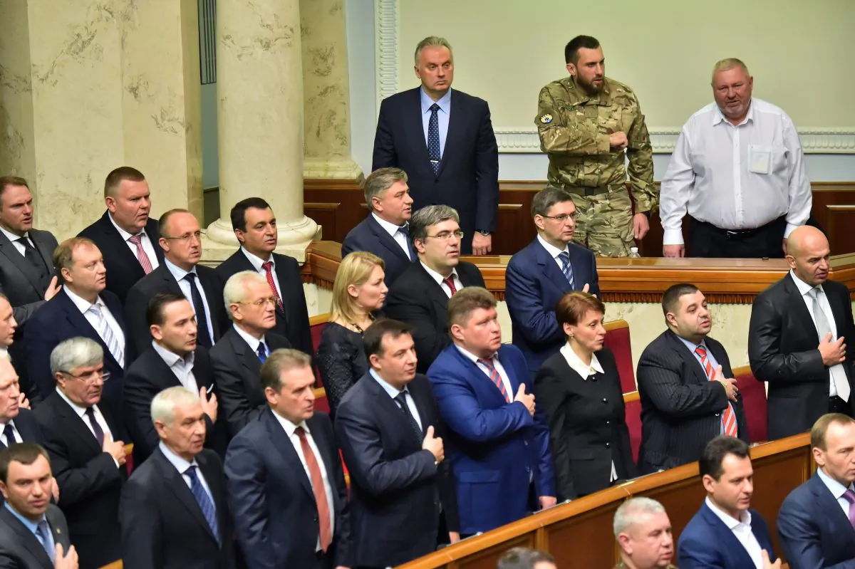 Deputies of the new Ukrainian parliament take the oath of office during the opening of a session in Kiev on Nov. 27, 2014. (Sergei Supinsky/AFP/Getty Images)