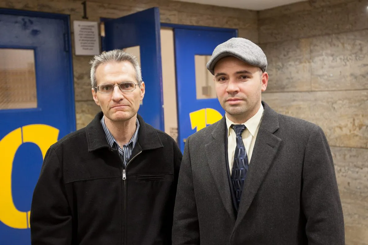 Absent Teacher Reserve teachers James Eterno (L) and Francesco Portelos after a Panel for Educational Policy meeting at High School of Fashion Industries, in Manhattan, N.Y., on Nov. 25, 2014. (Petr Svab/Epoch Times)
