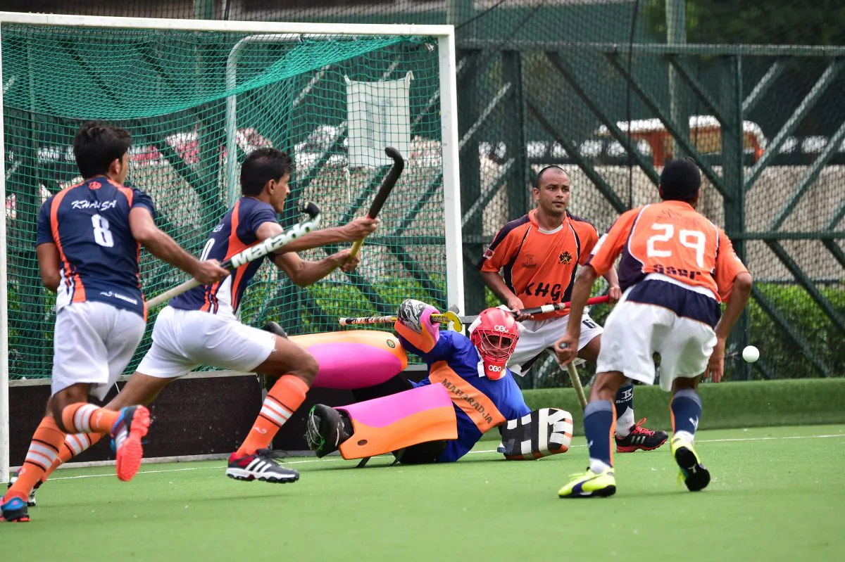 SSSC-A Goalie, Gurdeep Singh makes a fine save during the final of the Guru Nanak Cup Final against Khalsa-A at Happy Valley on Sunday Nov. 30, 2014. SSSC-A won an exciting final with a golden goal in extra time. (Bill Cox/Epoch Times)