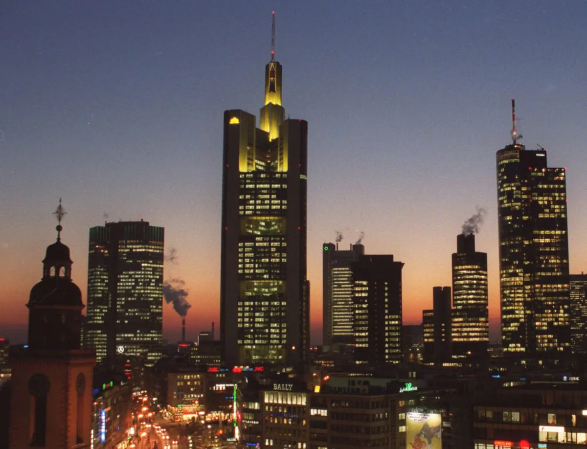 The banking district in downtown Frankfurt, Germany, with buildings from left: Church St. Catherine, European Central Bank, Commerzbank Headquarters, Dresdner Bank, Japan Tower, Citibank, Main Tower, on February 2000. On Dec. 2, 2014, the issue of looming deflation seems the main factor driving European policymakers when they meet later this week and forcing speculation that the ECB will switch on the printing press to help the economy by injecting new money into the economy. (AP Photo/Bernd Kammerer)