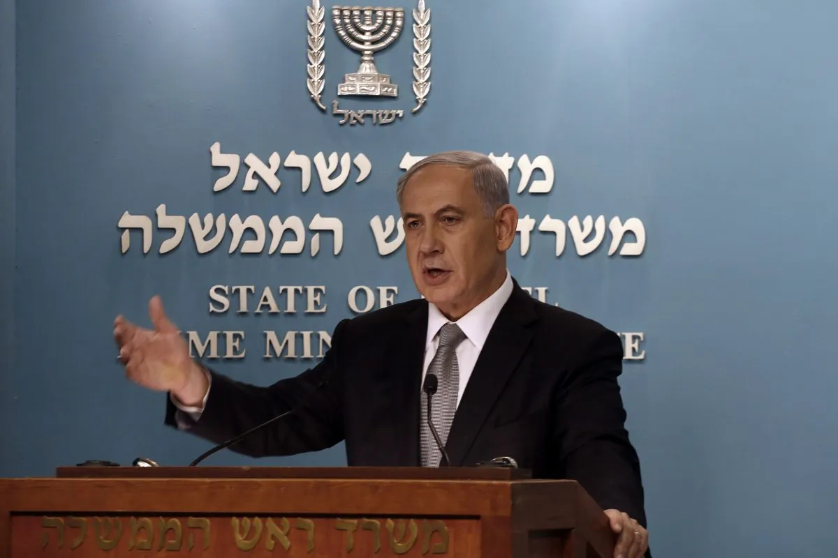 Israeli Prime Minister Benjamin Netanyahu gestures during a press conference in Jerusalem, Tuesday Dec. 2, 2014. Israel's prime minister fired two senior Cabinet ministers from his divided government Tuesday and said he would call early elections, plunging the country toward a heated campaign more than two years ahead of schedule. (AP Photo/Gali Tibbon)