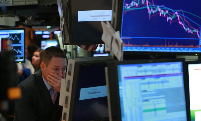 A trader works on the floor of the New York Stock Exchange in New York City on Sept. 15, 2008. (Spencer Platt/Getty Images)