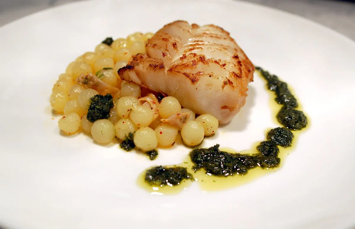 Cod with olive oil-poached potatoes. (Michael Tulipan)