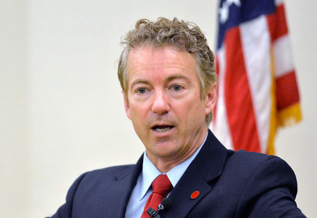 Sen. Rand Paul, R-Ky. speaks in Highland Heights, Ky., on Nov. 21, 2014. The presidential contest that's starting to take shape is exposing divisions among likely Republican candidates on the nation's role in global affairs. Among those outlining foreign policy this week: Bush, Rand Paul, Ted Cruz and Bobby Jindal, as well as the party's 2008 presidential nominee, Sen. John McCain. (AP Photo/Timothy D. Easley)