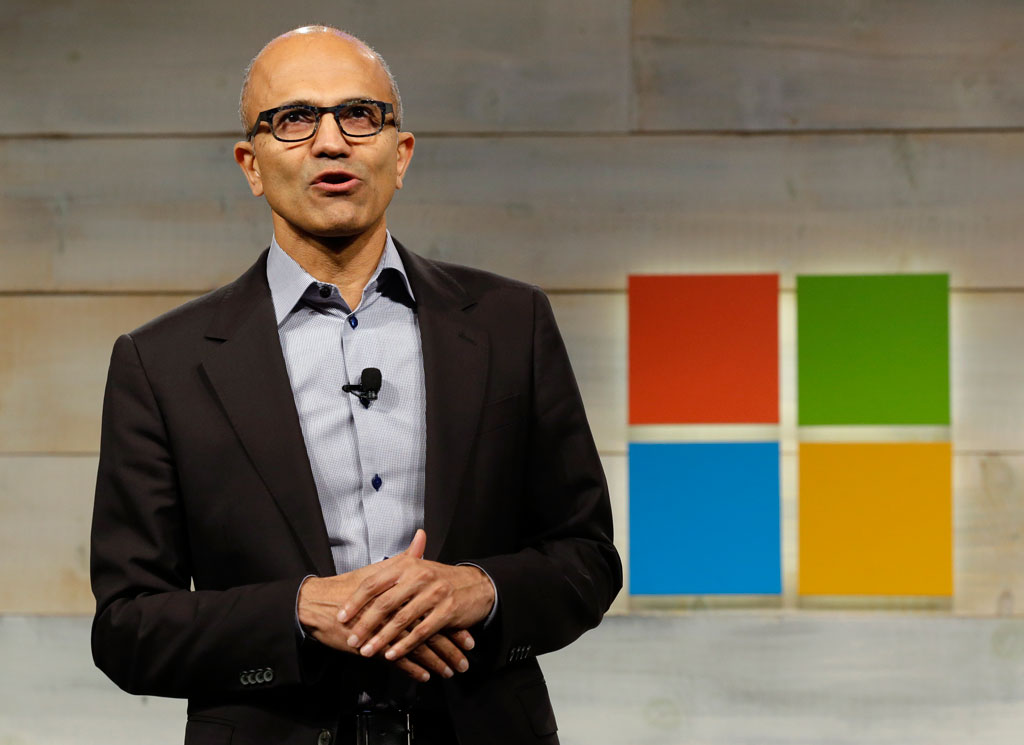 Microsoft CEO Satya Nadella speaks at Microsoft Corp.'s annual shareholders meeting in Bellevue, Wash., on Wednesday, Dec. 3, 2014. The annual meeting was Nadella's first as head of Microsoft. (AP Photo/Ted S. Warren)