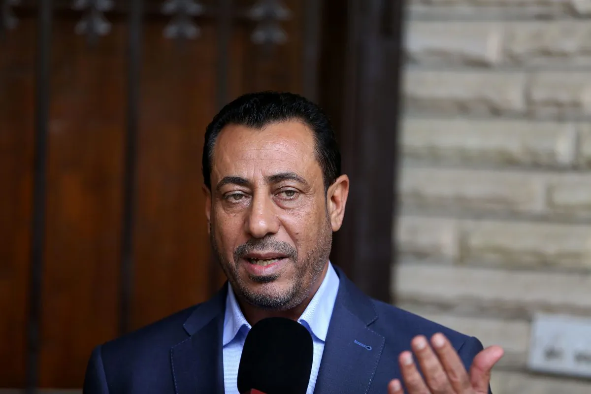 Hakim al-Zamili, a parliament member and head of Security and Defense Committee, speaks during an interview with The Associated Press in Baghdad, Iraq, on Wednesday, Dec. 3, 2014. Mixed reactions were voiced in Baghdad on Wednesday to Pentagon reports that Iran launched airstrikes in Iraq against the Islamic State group. (AP Photo/Karim Kadim)